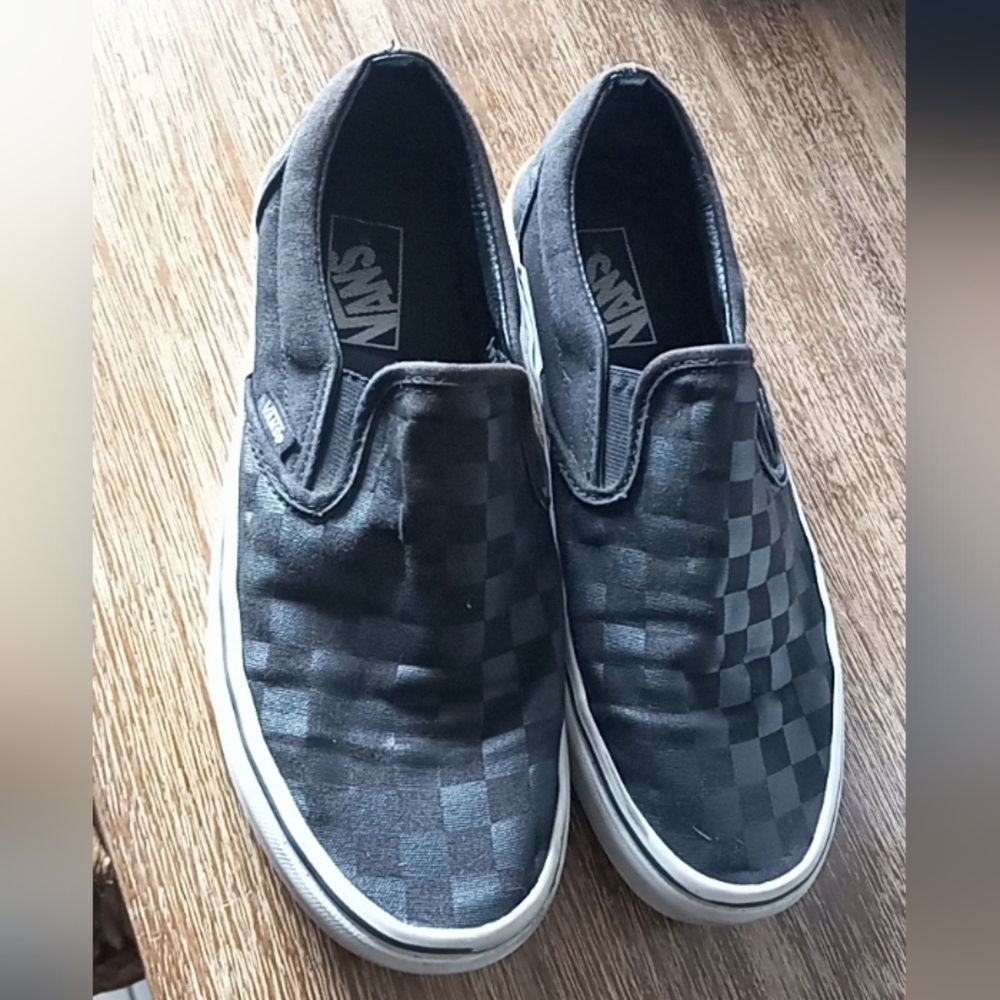 Vans black checkered size 8 in men and 9.5 in women